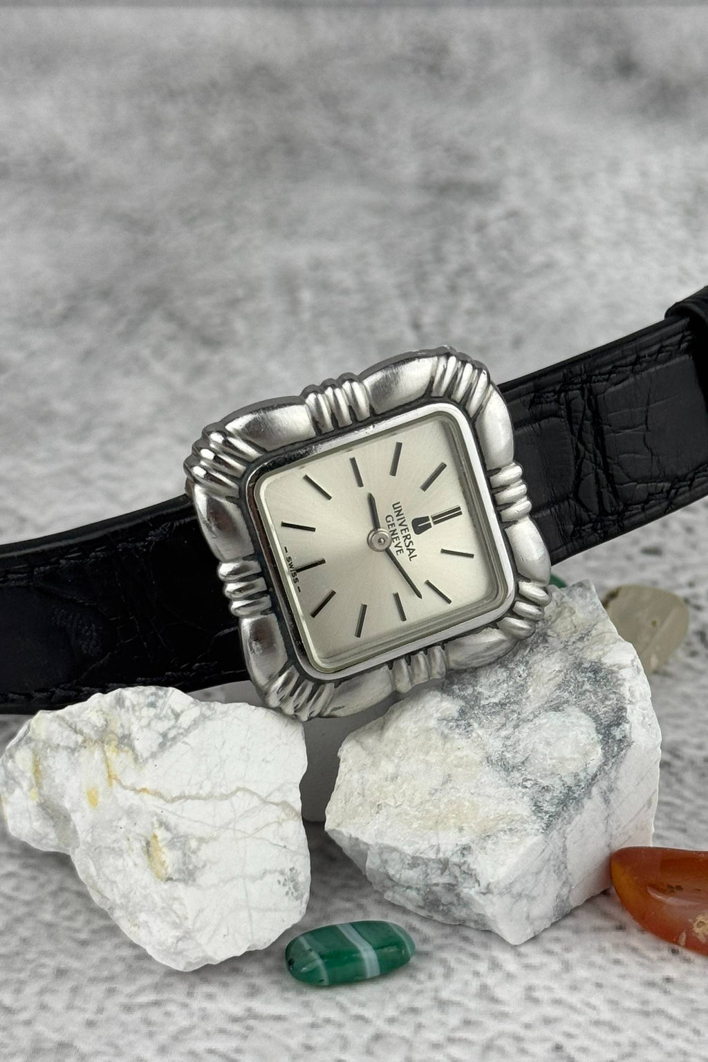 Vintage Universal Genève Flower Cushion wristwatch with rare sculptural stainless steel case and manual movement