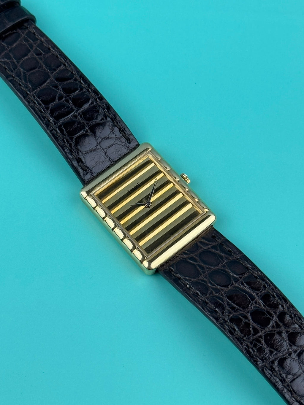Piaget Ref. 91480 vintage dress watch in 18K yellow gold with ribbed gold dial and slim tank case, c. 1980s
