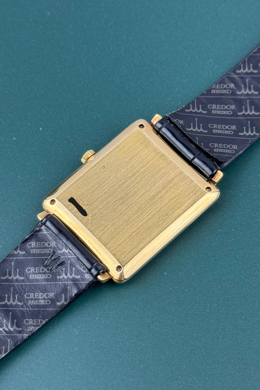 Case back of Piaget Ref. 9254 in solid gold, showcasing rectangular tank shape and vintage proportions