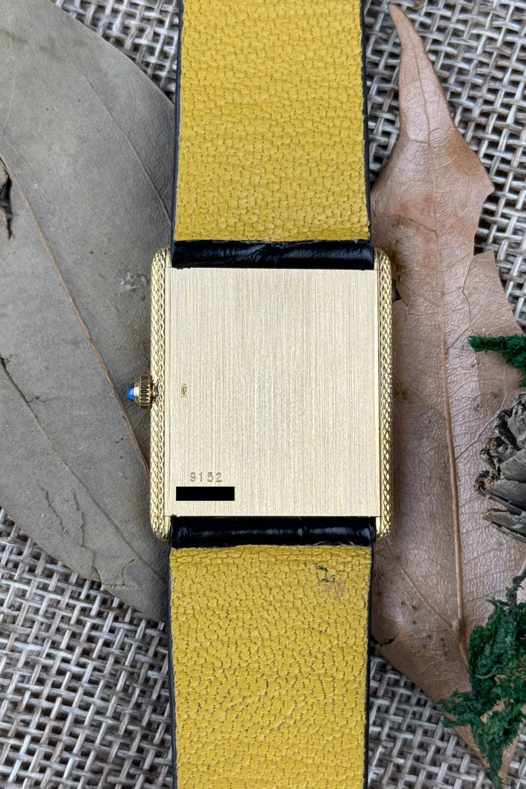 Case back of Piaget Ref. 9152 in solid 18K yellow gold with rectangular tank-style design