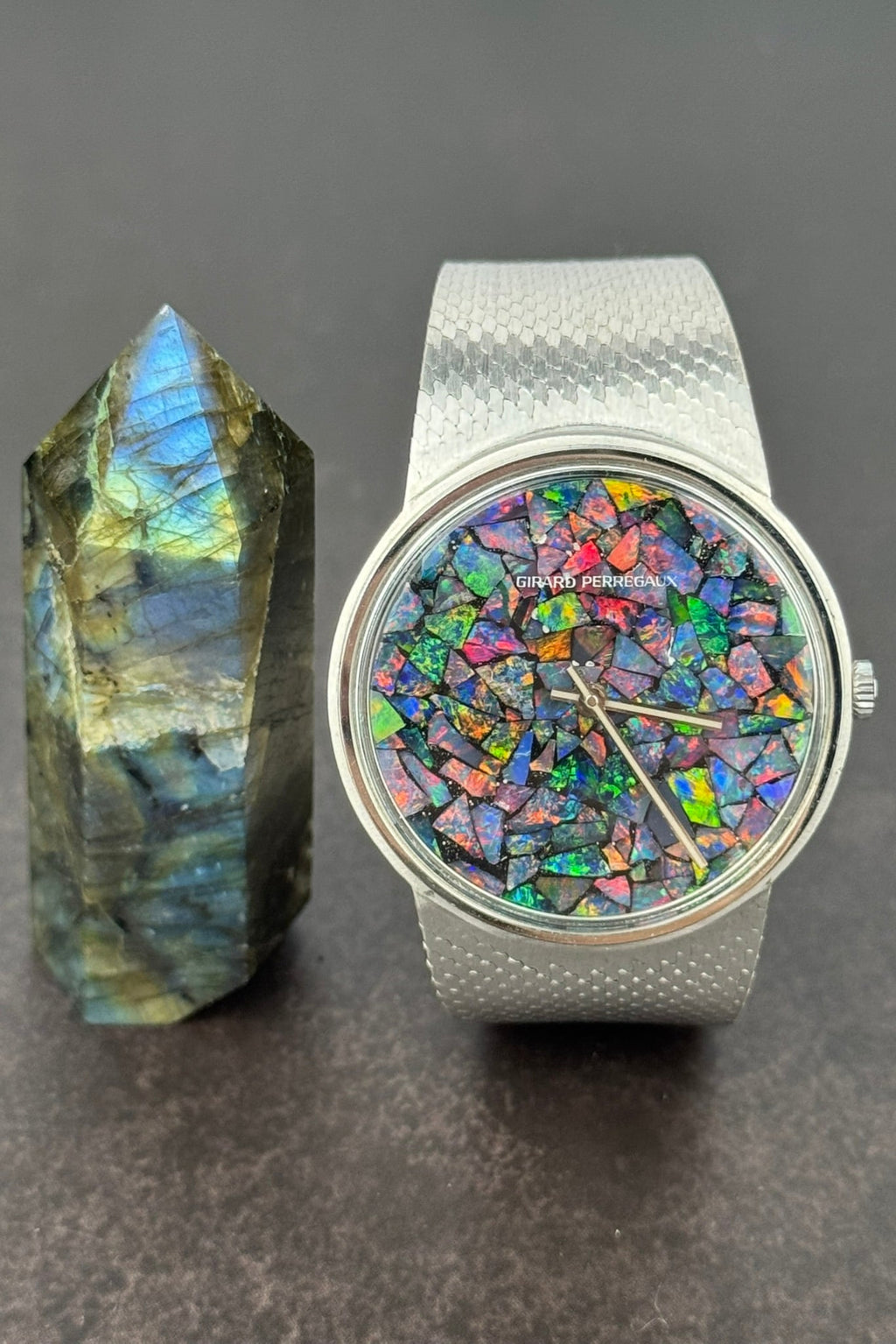 Steel Girard-Perregaux wristwatch featuring luminous opal dial and integrated bracelet for 15.5–17cm wrists