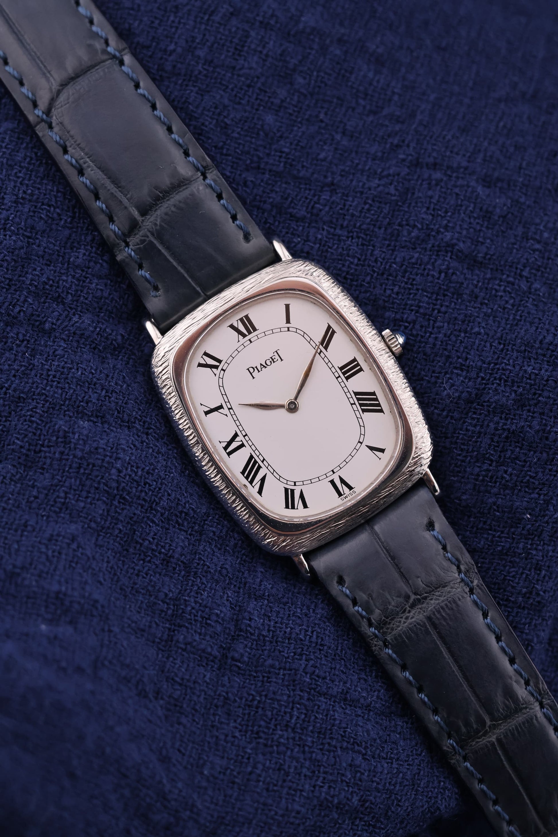 Piaget Ref. 9251 vintage tank watch in 18K white gold with bark-textured case and Roman numeral dial, c. 1980