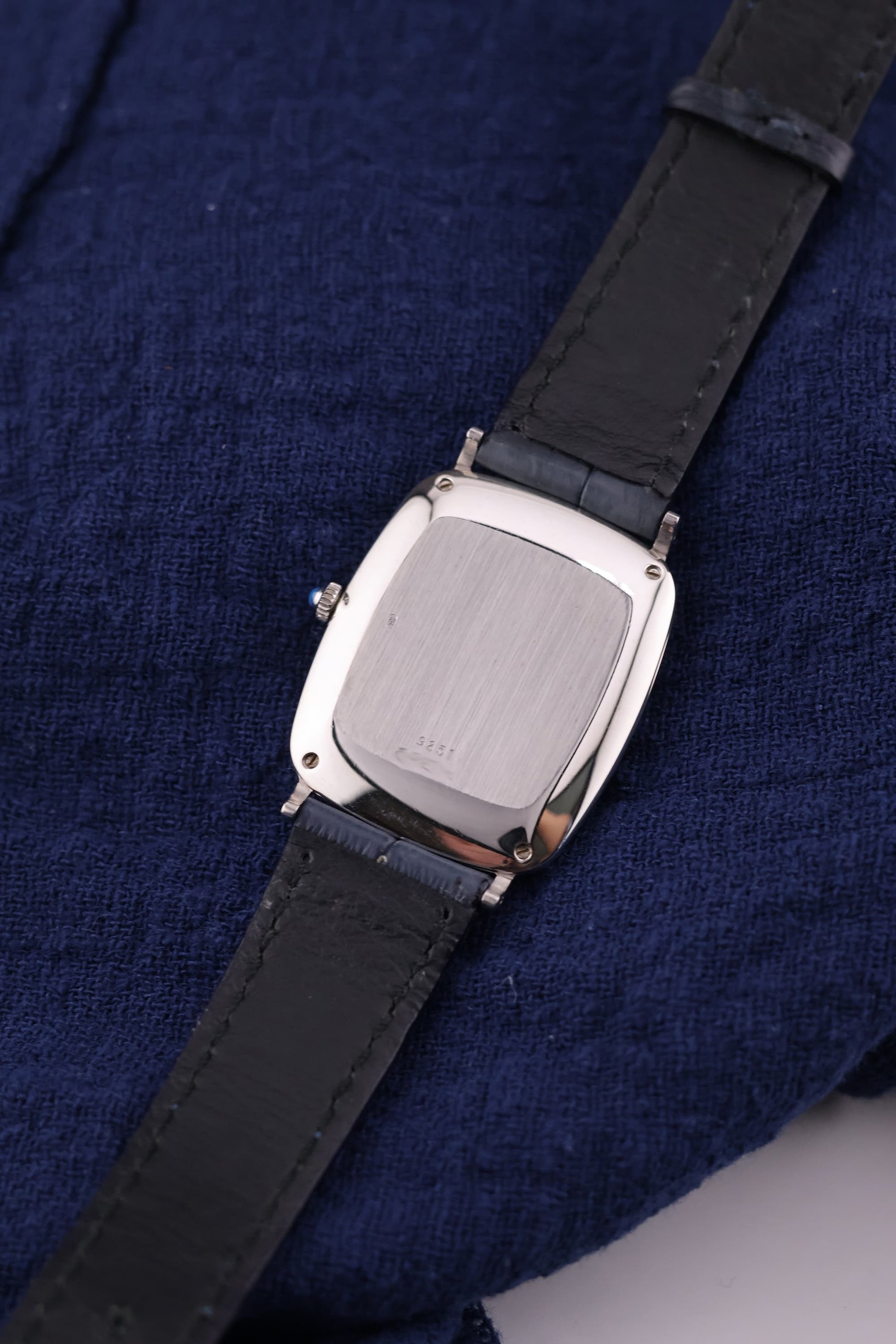 Case back of Piaget 9251 in solid white gold, highlighting lug-to-lug tank shape and vintage finishing