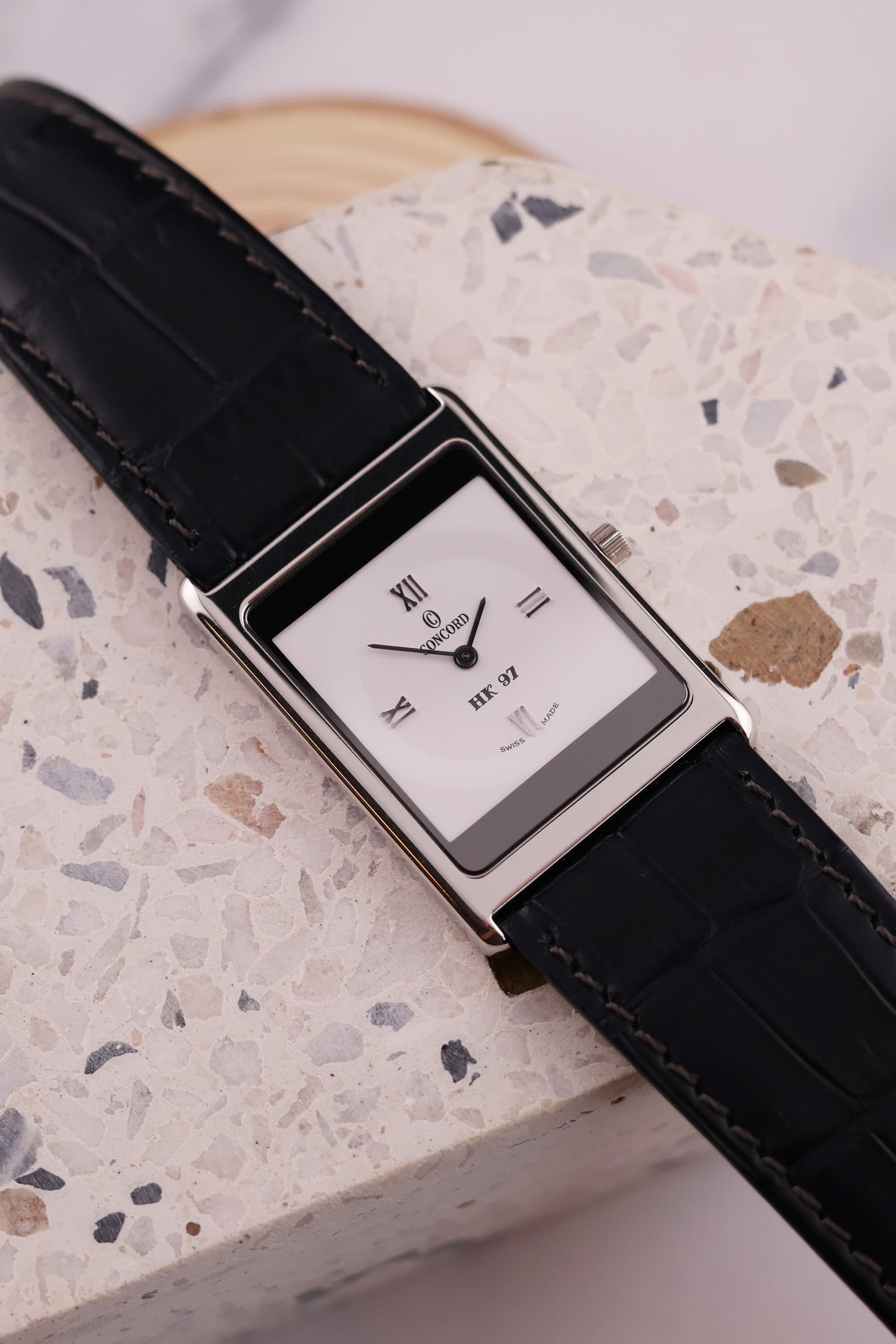Angled close-up of the Concord Delirium 1997 dial, highlighting the ultra-thin platinum case and refined minimalist design.