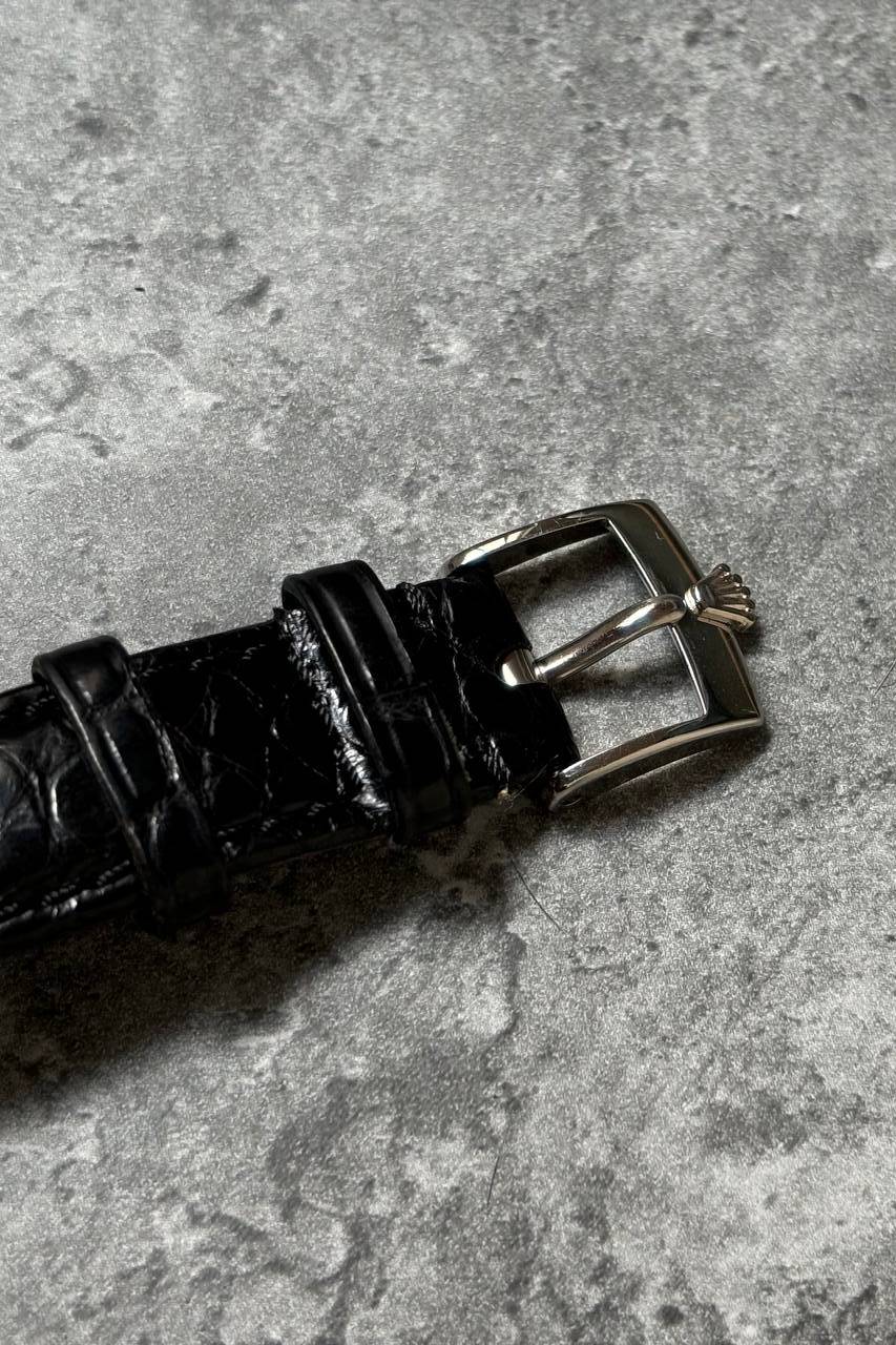 Close-up of Rolex-signed white gold buckle on Cellini leather strap, included with 1997 set