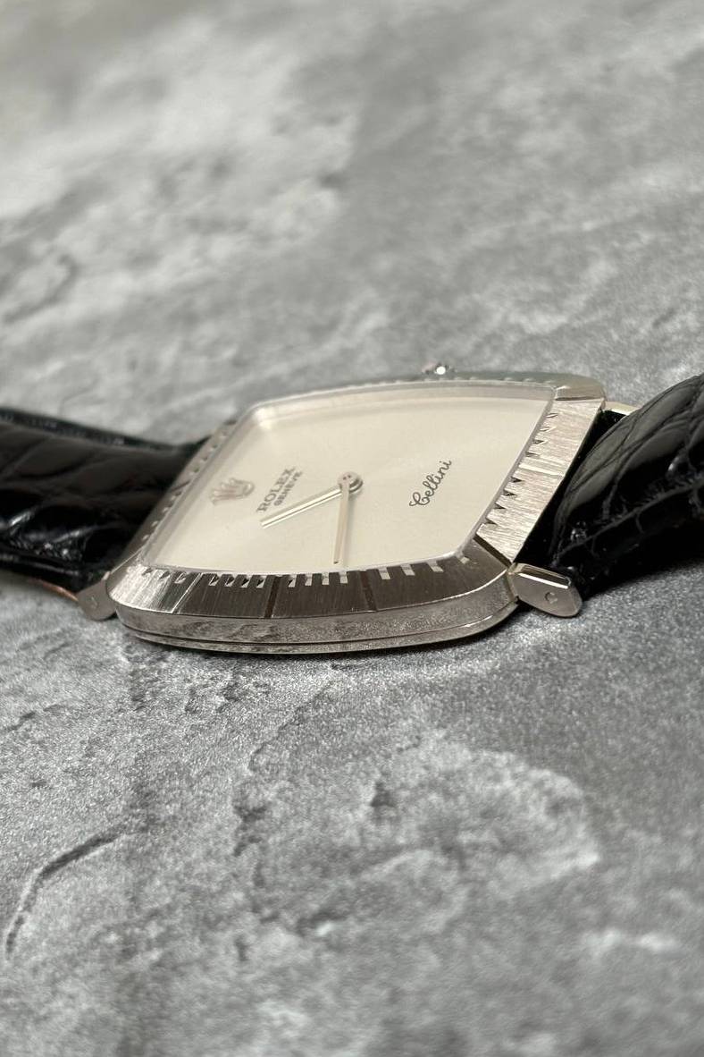 Side profile of Rolex Cellini Ref. 4087 showing slim white gold cushion case and curved lugs