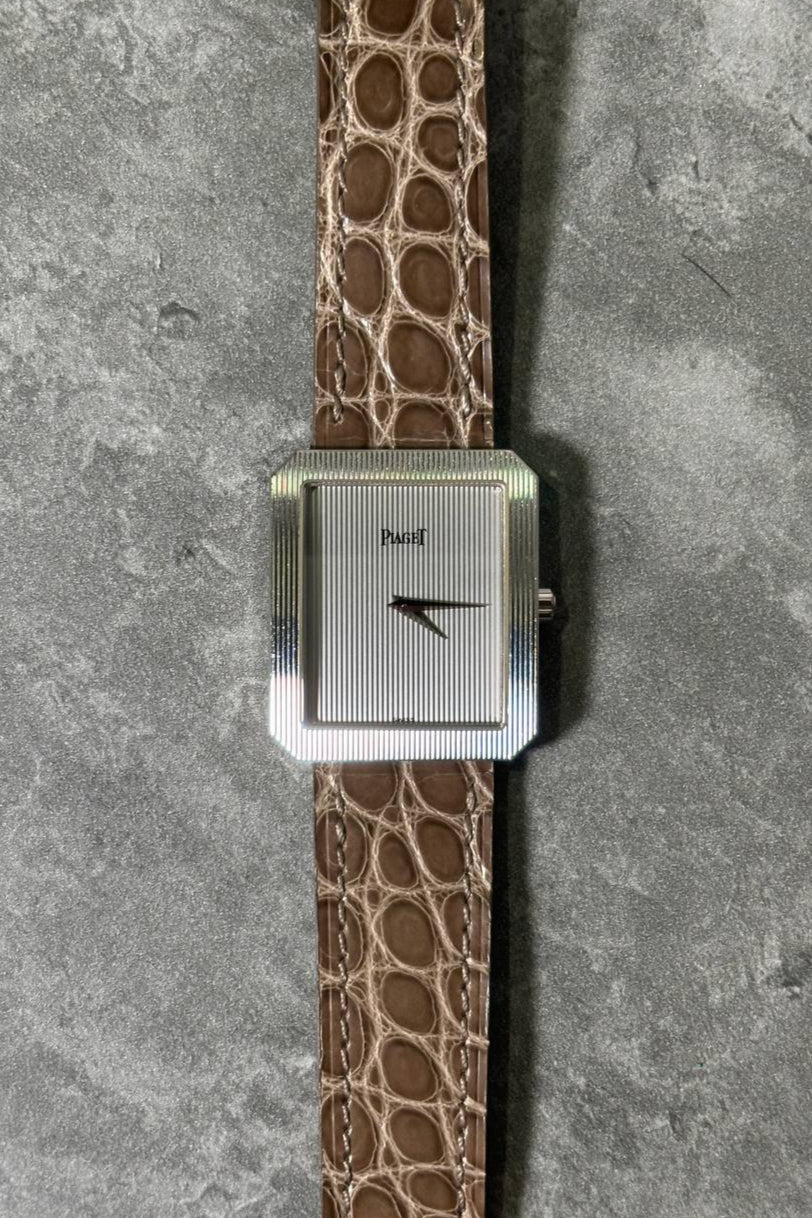 Piaget Protocole 90154 vintage watch in 18K white gold with tapestry-engraved dial and bezel, c. 1990s