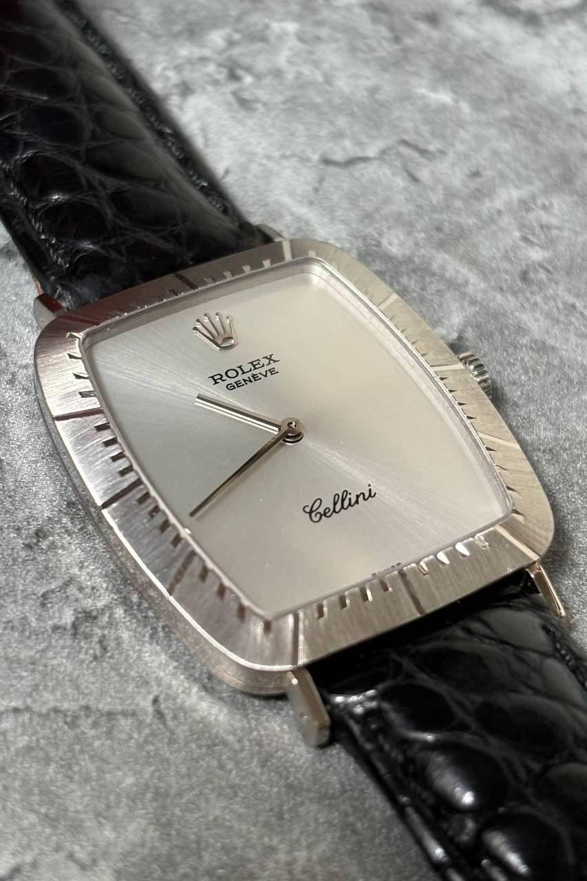 Rolex Cellini Ref. 4087 vintage dress watch with silver sunburst dial and cushion-shaped 18K white gold case