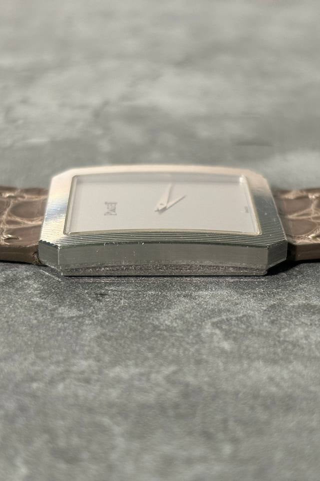 Side profile of Piaget 90154 showcasing sharp white gold case geometry and integrated lugs