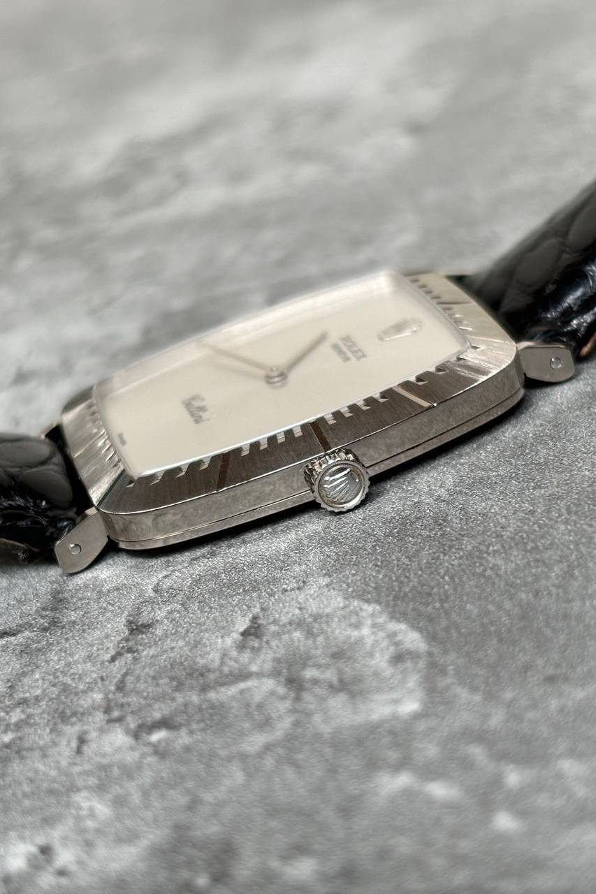 Close-up side view of Rolex Cellini 4087 showing fluted crown and refined white gold case finish