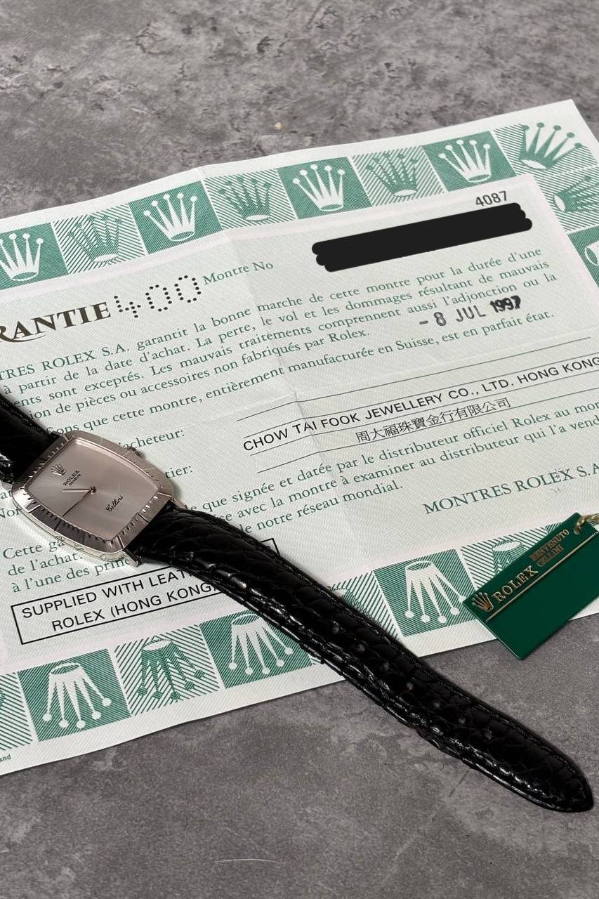 Rolex Cellini 4087 watch displayed with original Rolex papers and 18K white gold buckle, 1997 full set